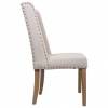 Silla de madera tapizada en beige lateral