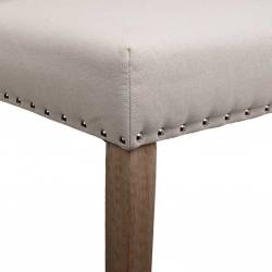 Silla de madera tapizada en beige detalle 2